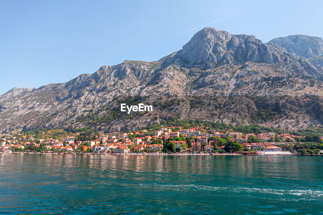 Coastal town with resorts . kotor montenegro scenery . houses on the seaside