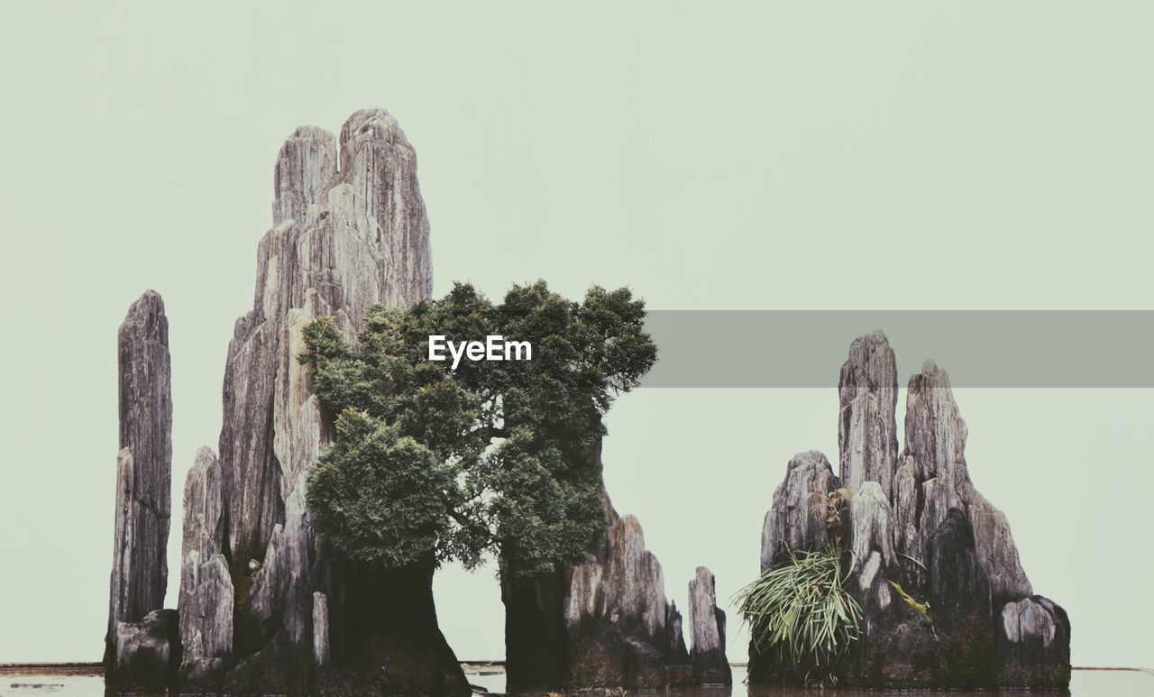 Rock formations against clear sky