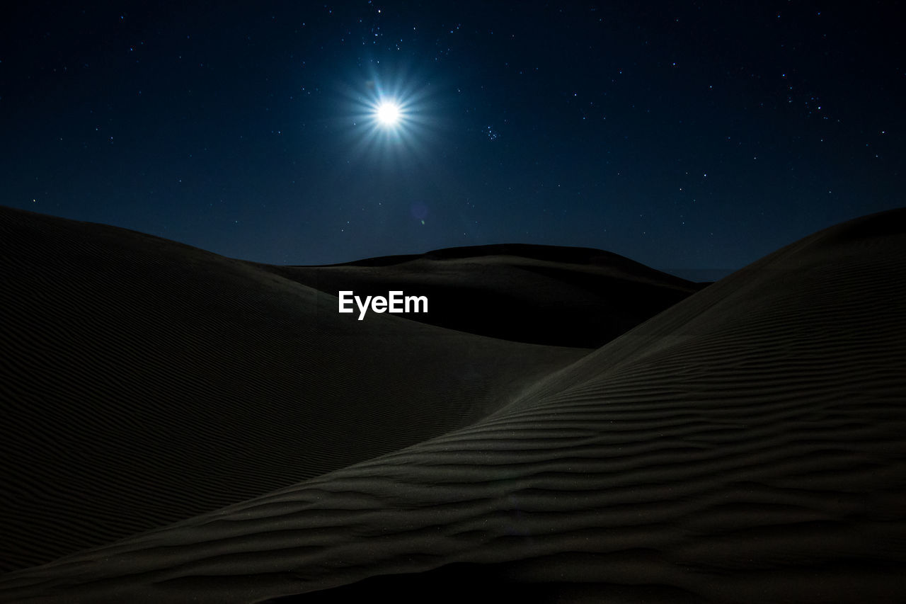 Scenic view of desert at night