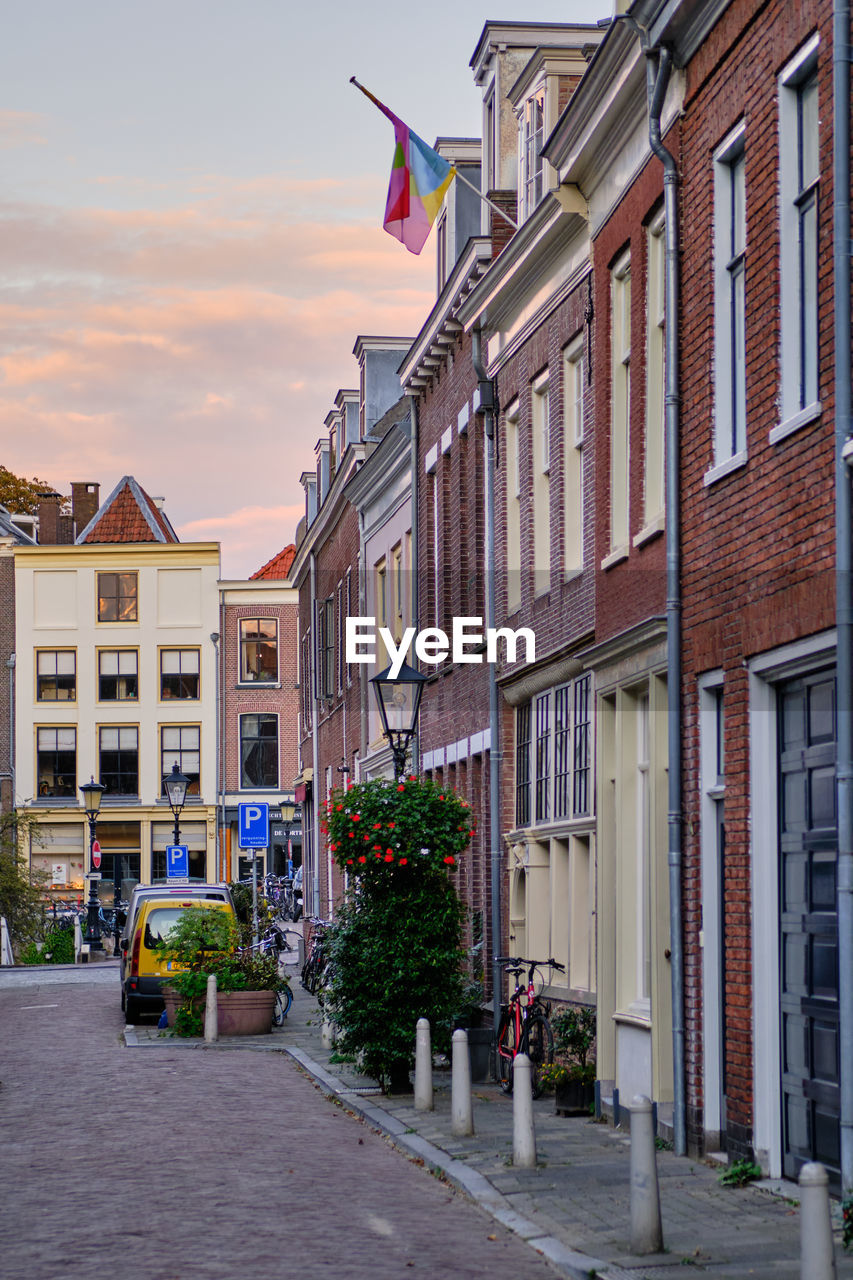 Utrecht, the netherlands. terraced houses on an empty street in the city centre. autumn evening.