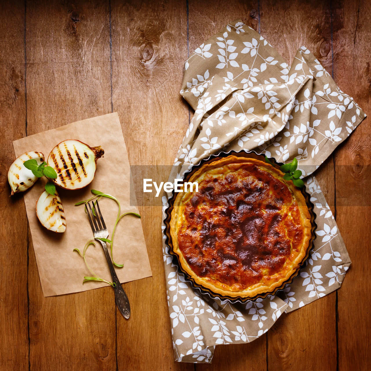 HIGH ANGLE VIEW OF PIZZA ON TABLE AGAINST BLACK BACKGROUND