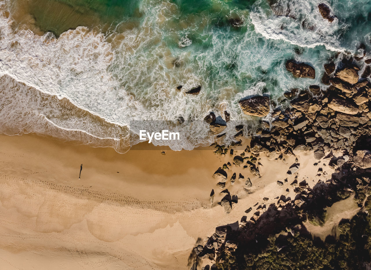 Aerial view of rocks at beach