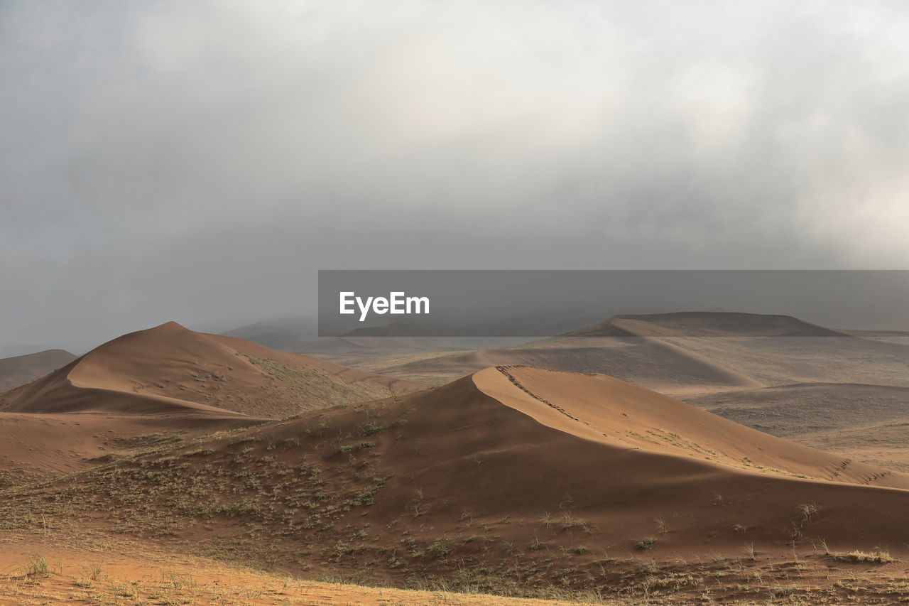 1133 early morning-misty light over the sand dunes of the badain jaran desert. inner mongolia-china.