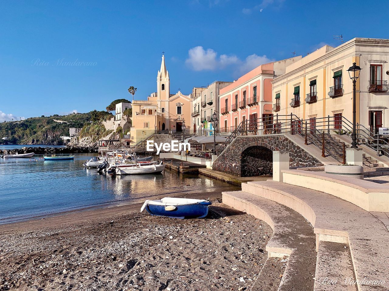 VIEW OF BUILDINGS AGAINST BLUE SKY