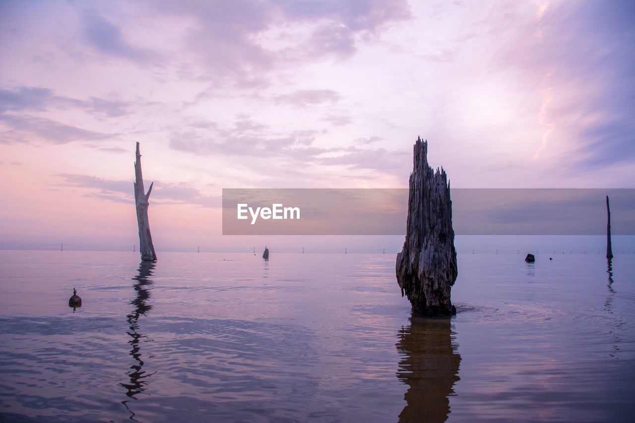 SCENIC VIEW OF SEA DURING SUNSET