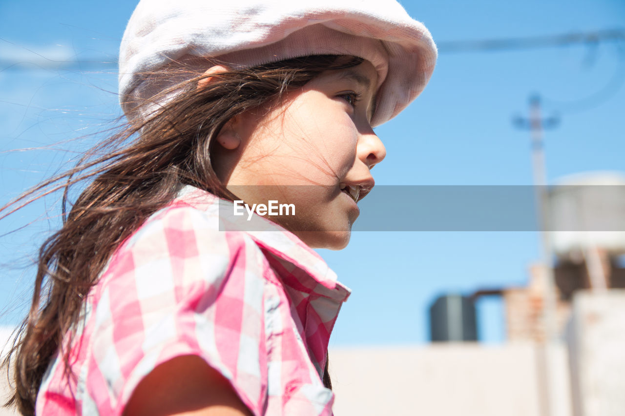 Brunette argentinian girl with flat cap