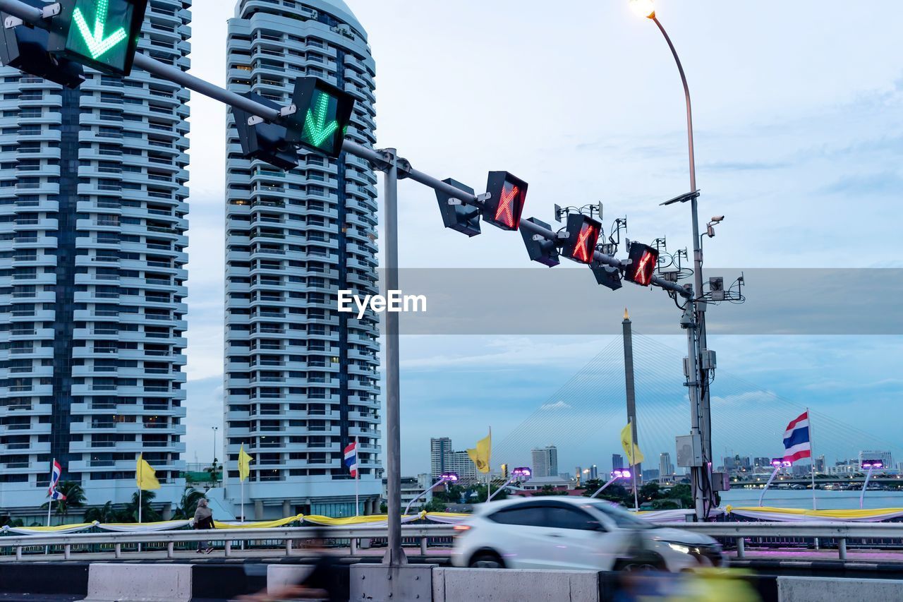 City street and modern buildings against sky