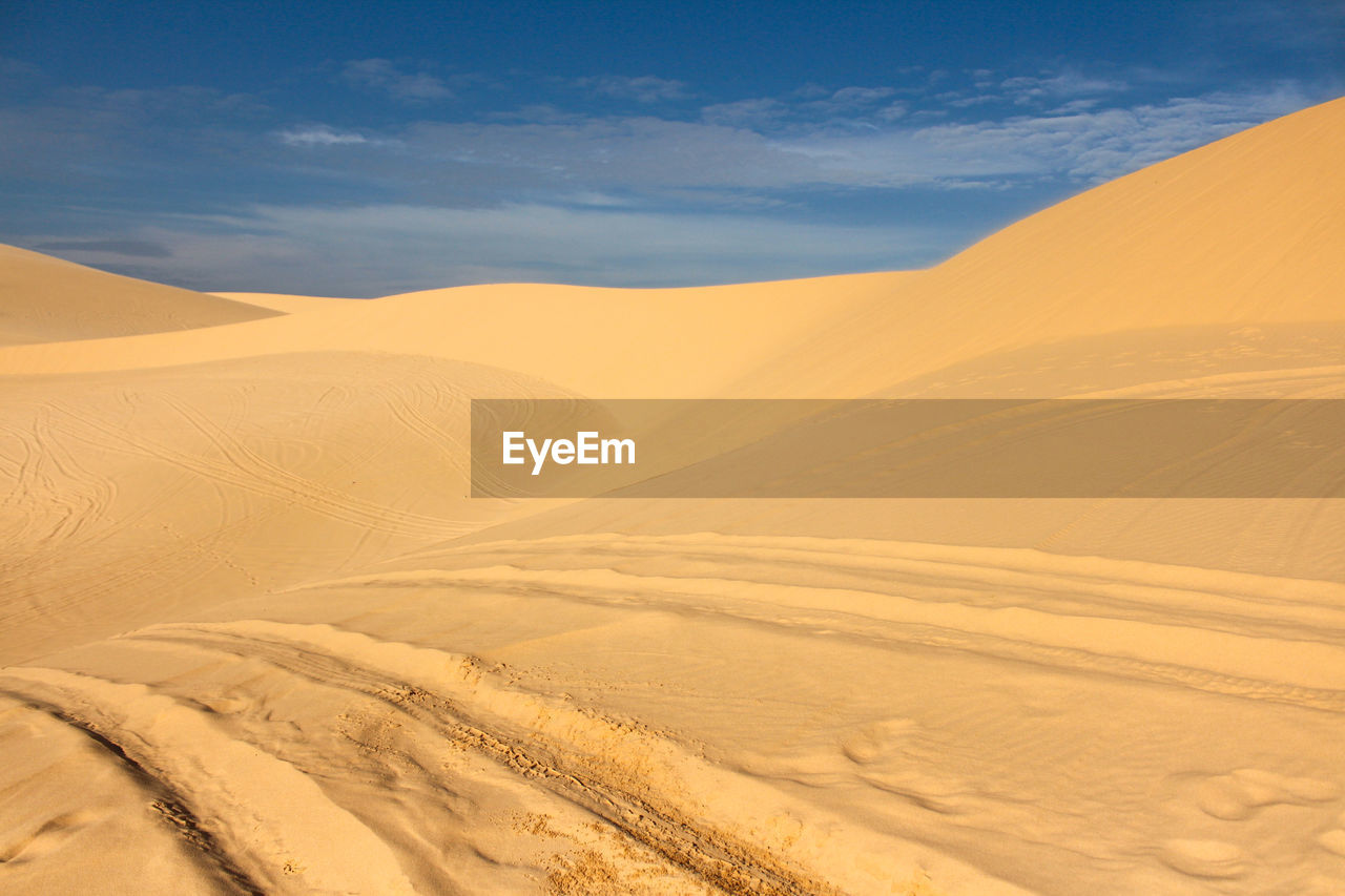 Scenic view of desert against sky
