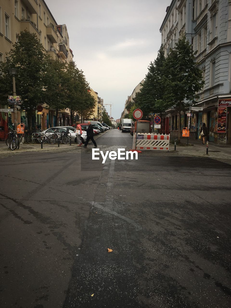 VIEW OF CITY STREET AGAINST SKY