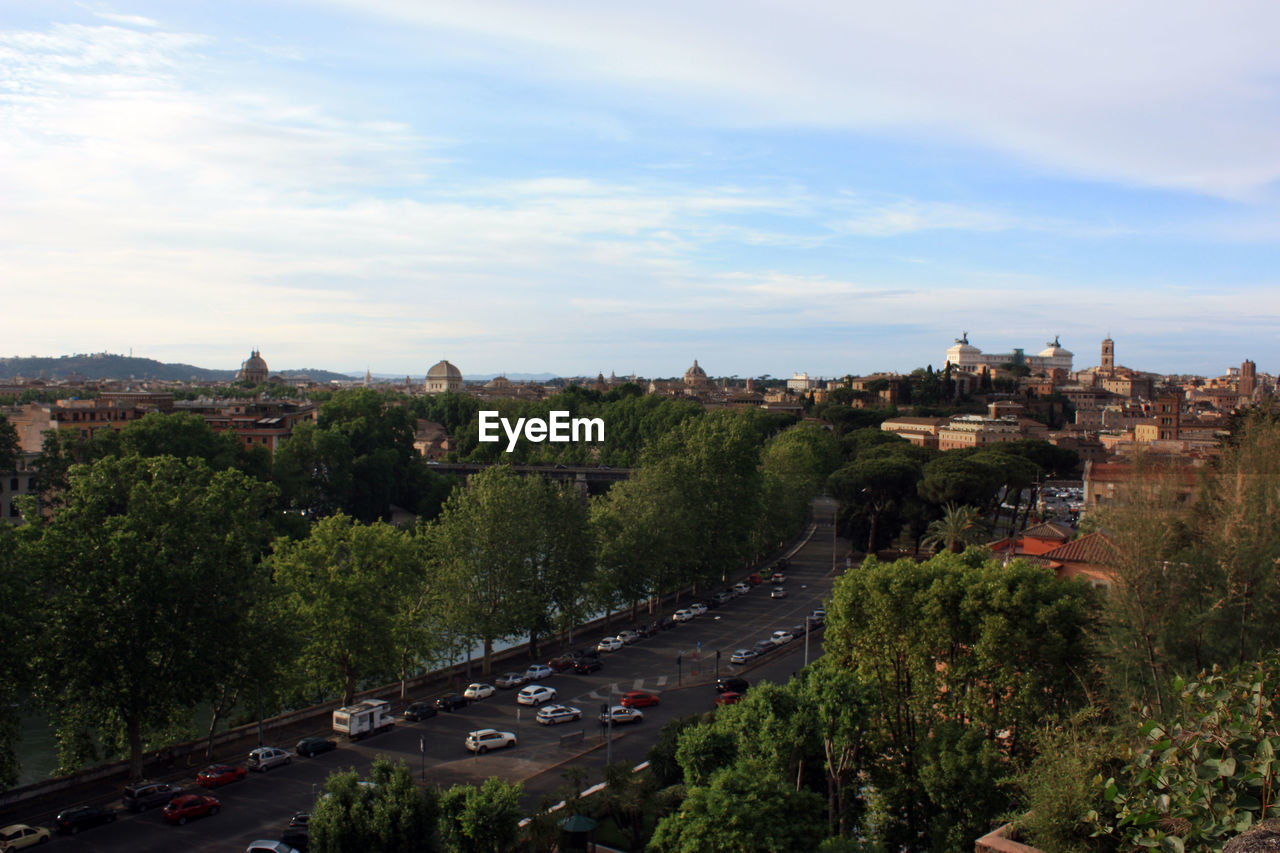 HIGH ANGLE VIEW OF BUILDINGS AGAINST SKY