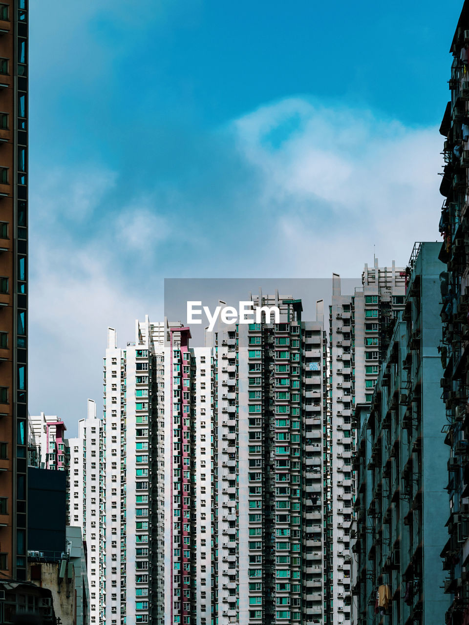 Modern buildings against sky in city