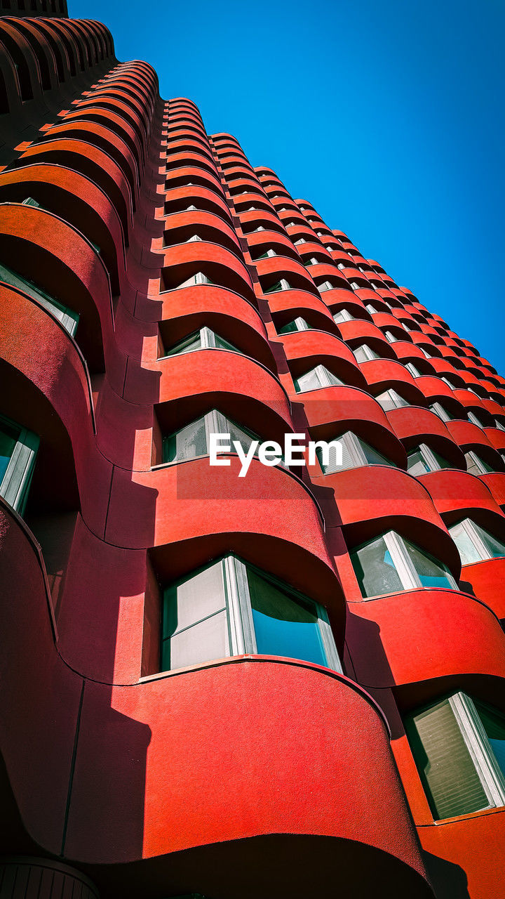 low angle view of roof tiles against clear sky