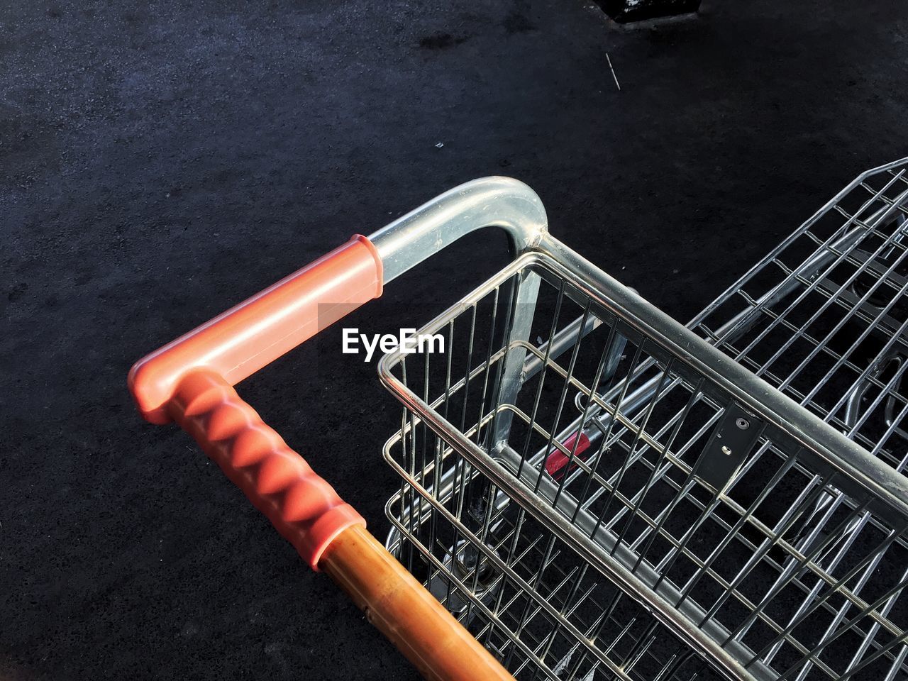 High angle view shopping cart on street