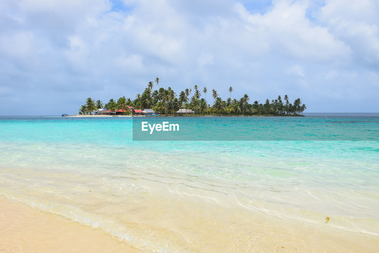 Scenic view of beach against sky