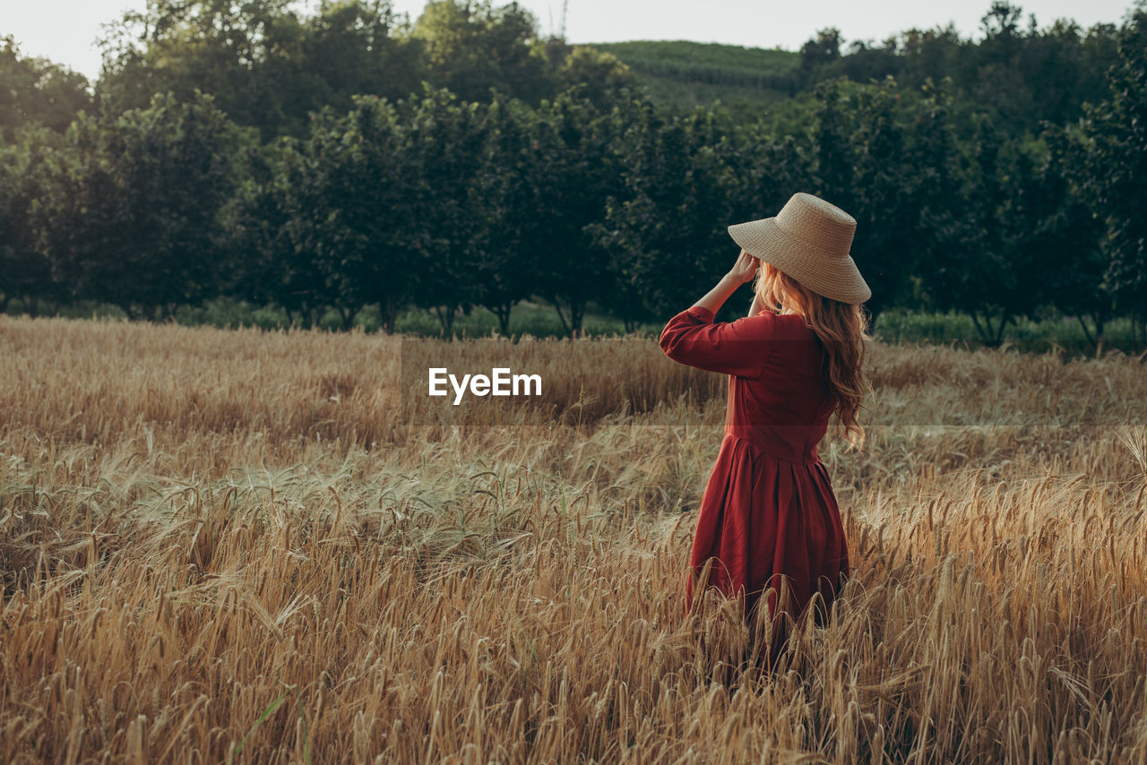 Woman standing on field