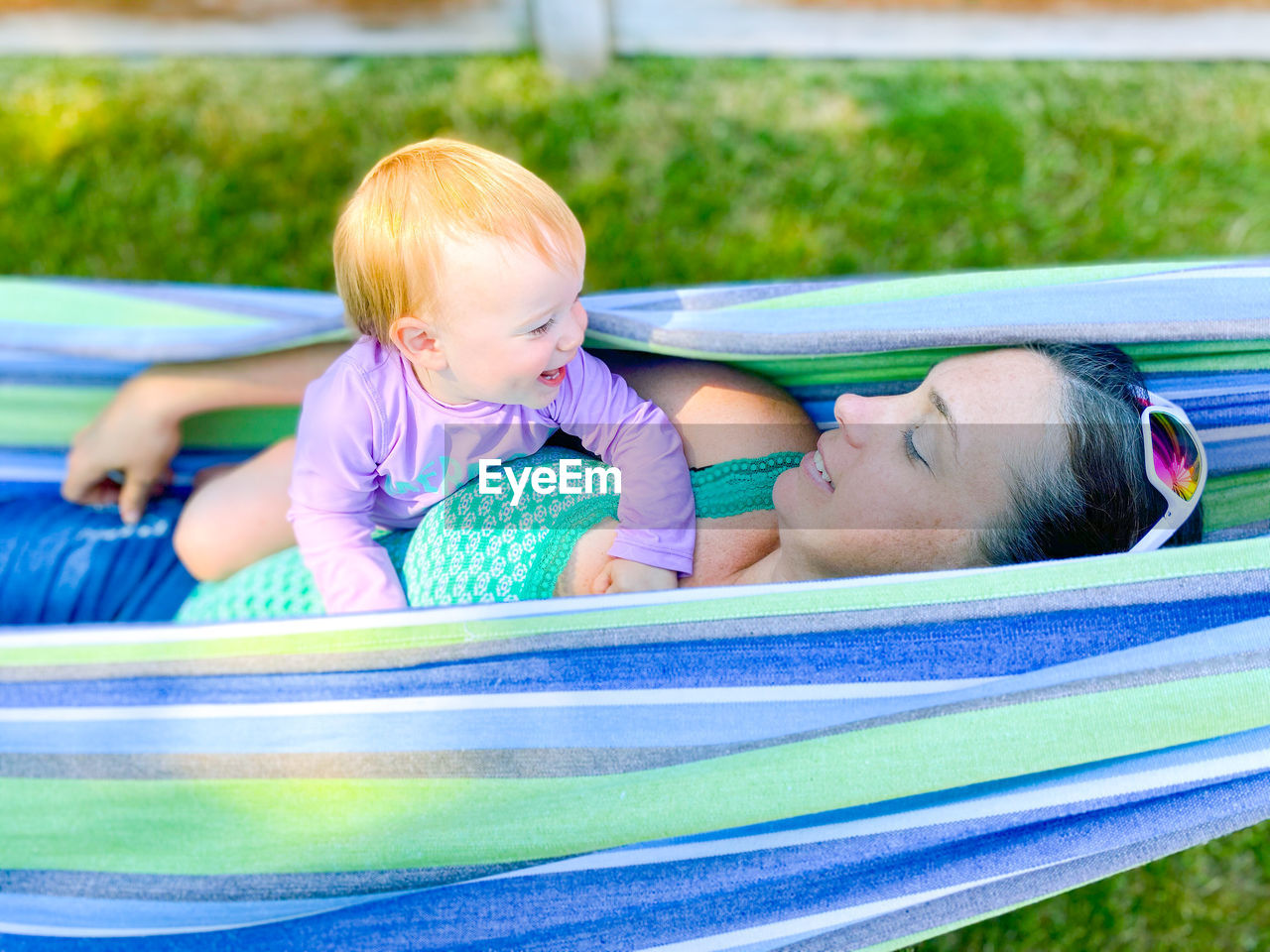 Mom and infant daughter in a hammock