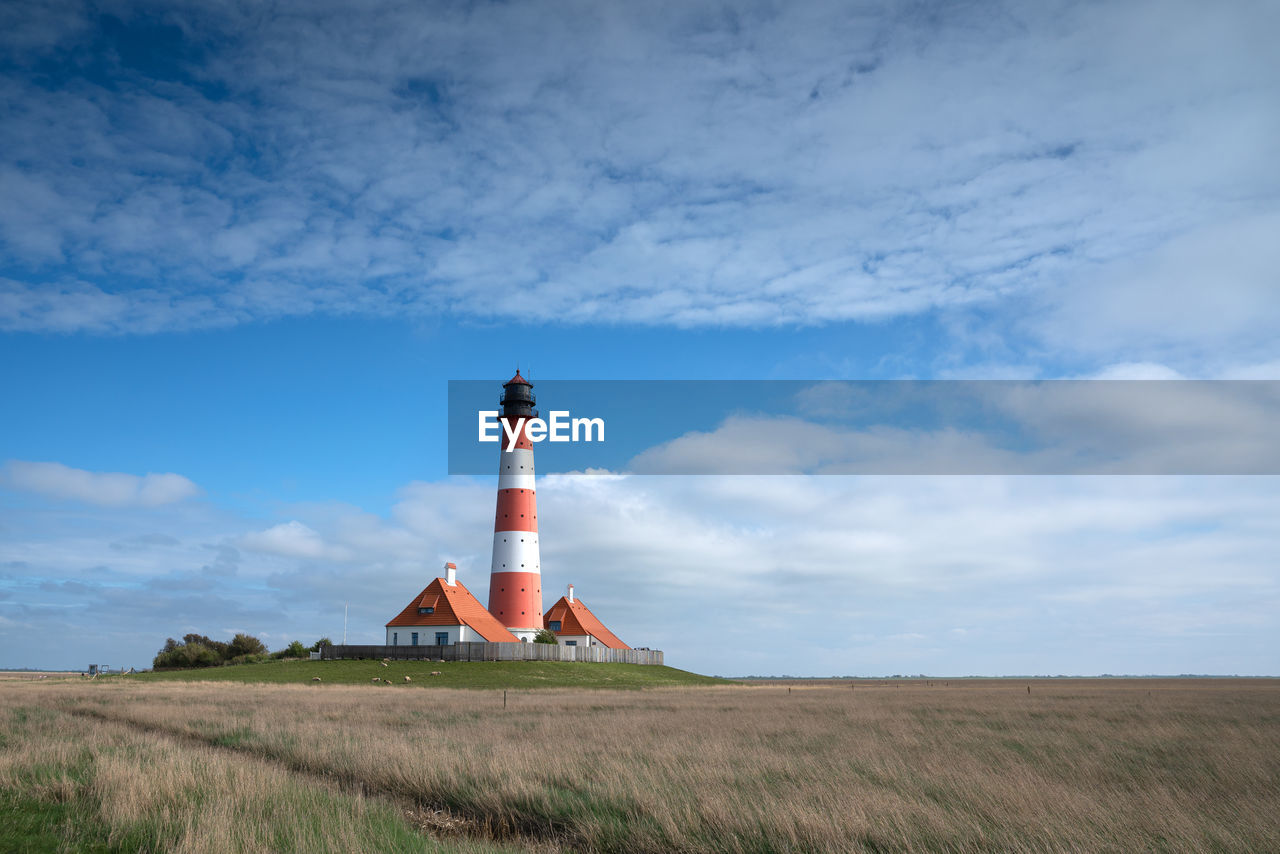 Panoramic image of westerhever lighthouse against sky, north frisia, germany