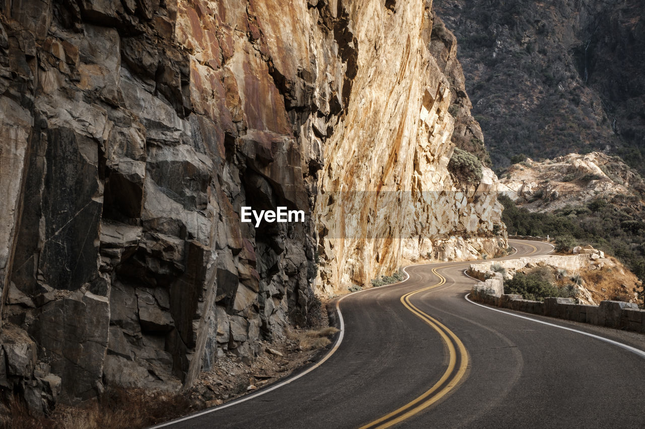 Road passing through rock formation