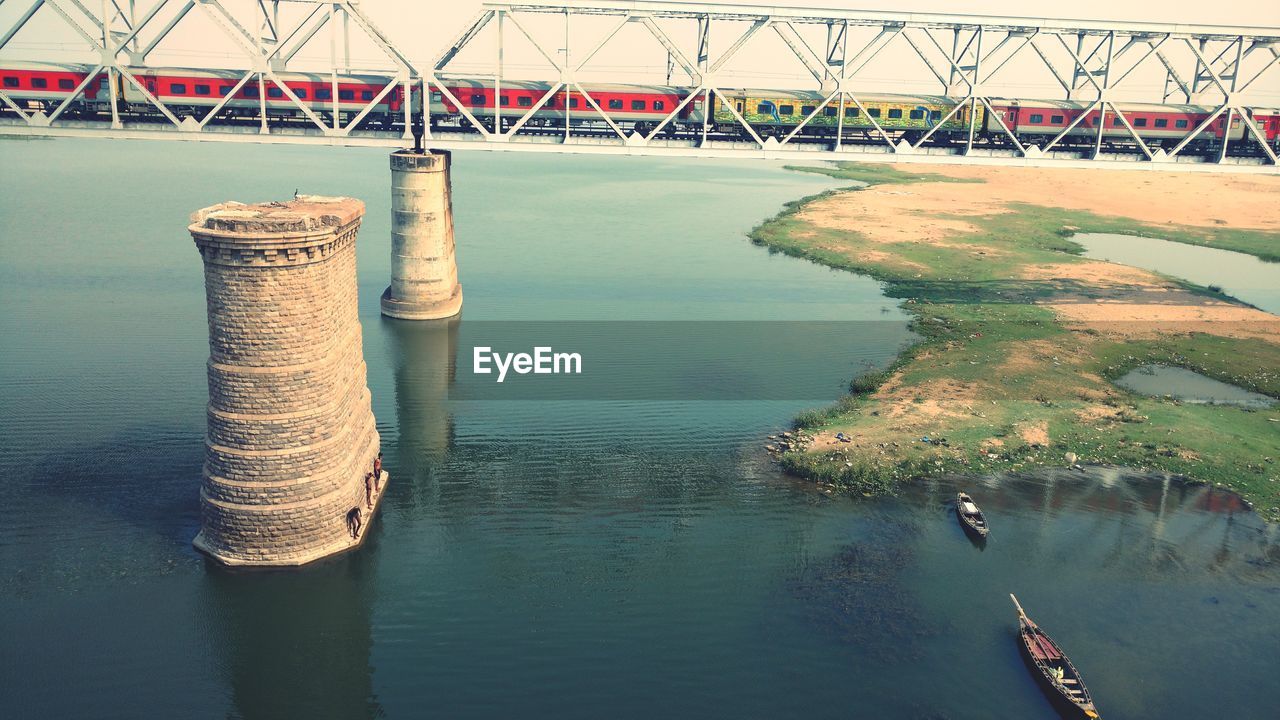 Bridge over river against sky