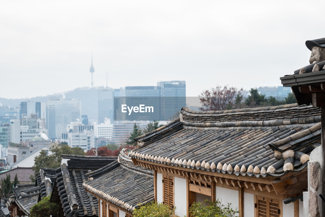 BUILDINGS AGAINST SKY