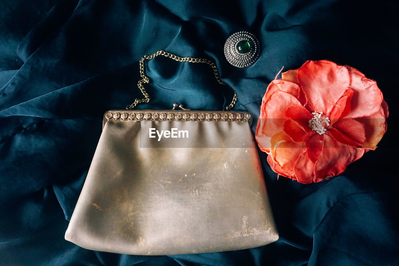 An old golden purse and women accessories