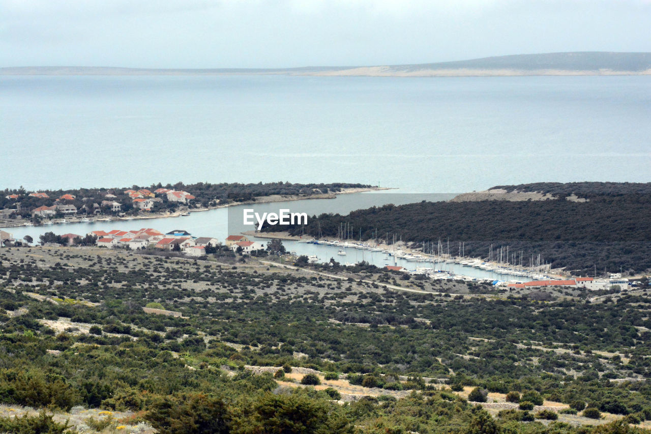 High angle view of beach and sea against sky