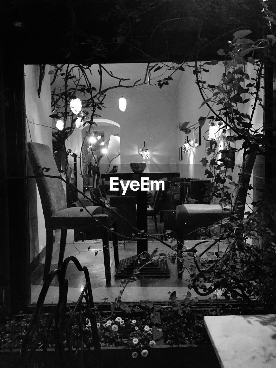 Empty chairs and table in restaurant