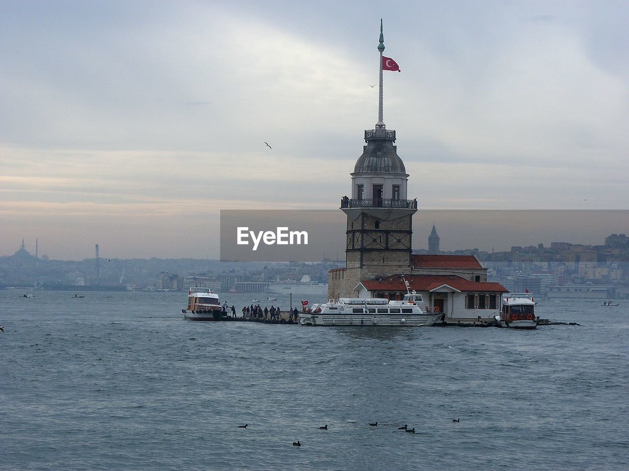 VIEW OF SHIP IN SEA AGAINST SKY