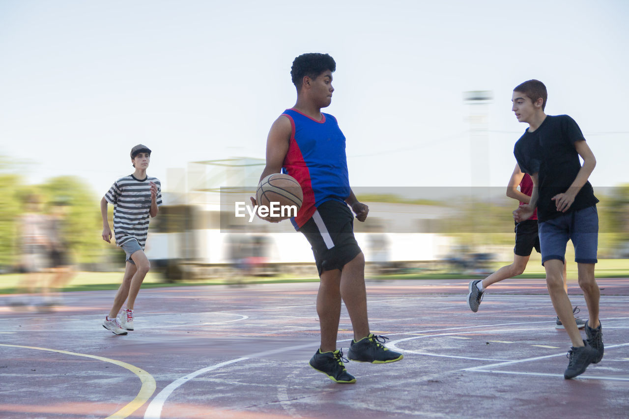 Teen basketball players