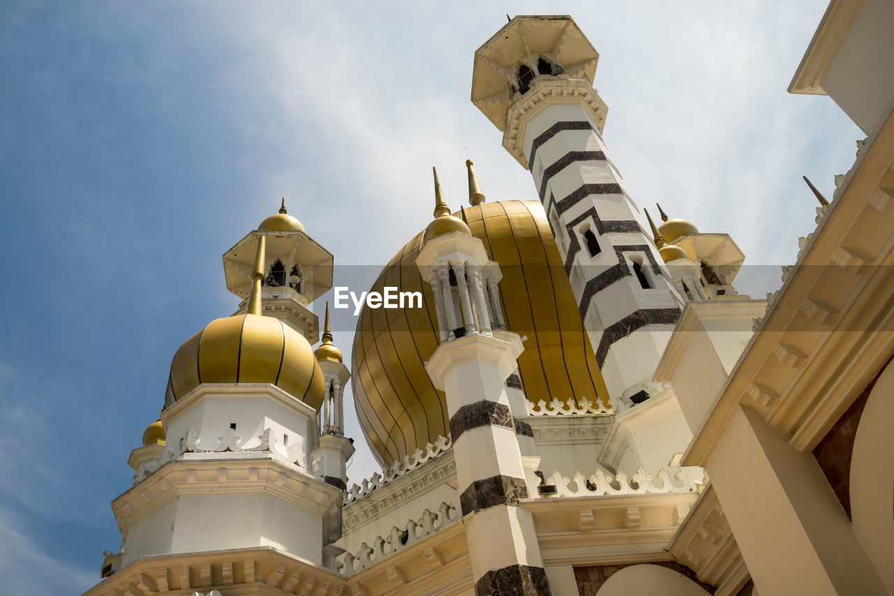 Low angle view of ubudiah mosque against sky