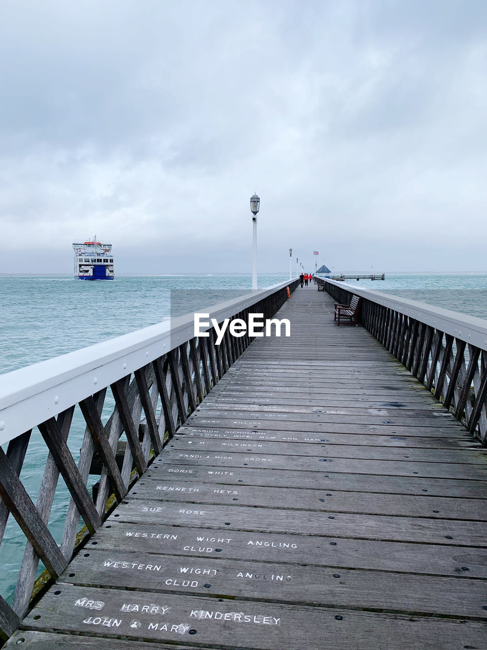 Pier over sea against sky