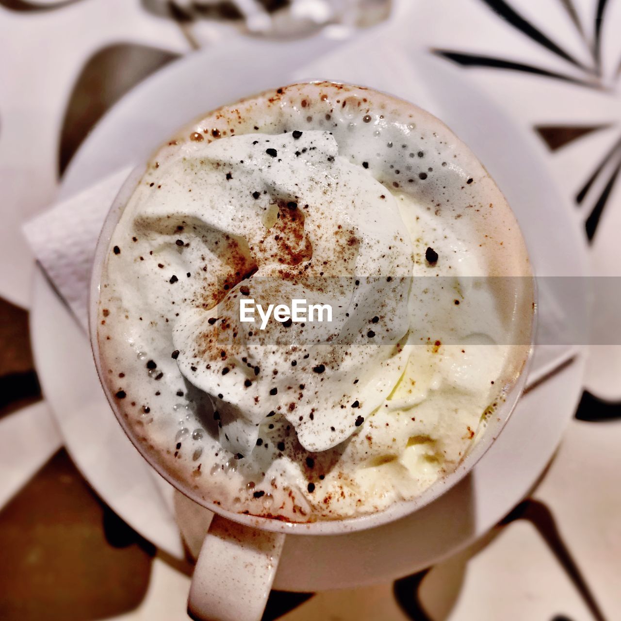 CLOSE-UP OF COFFEE ON TABLE