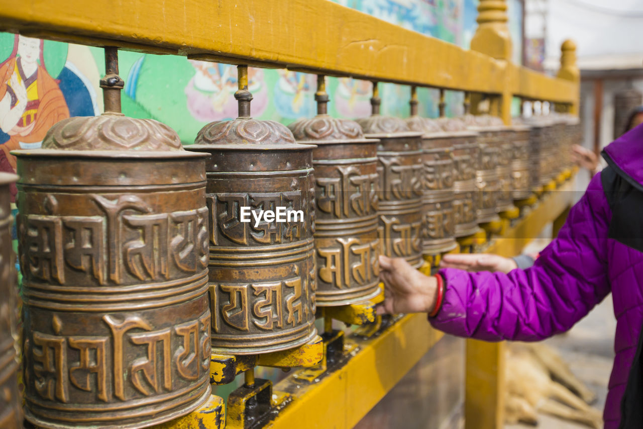 MIDSECTION OF PERSON IN TEMPLE