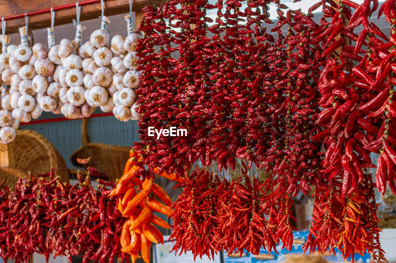 VARIOUS FRUITS FOR SALE AT MARKET STALL