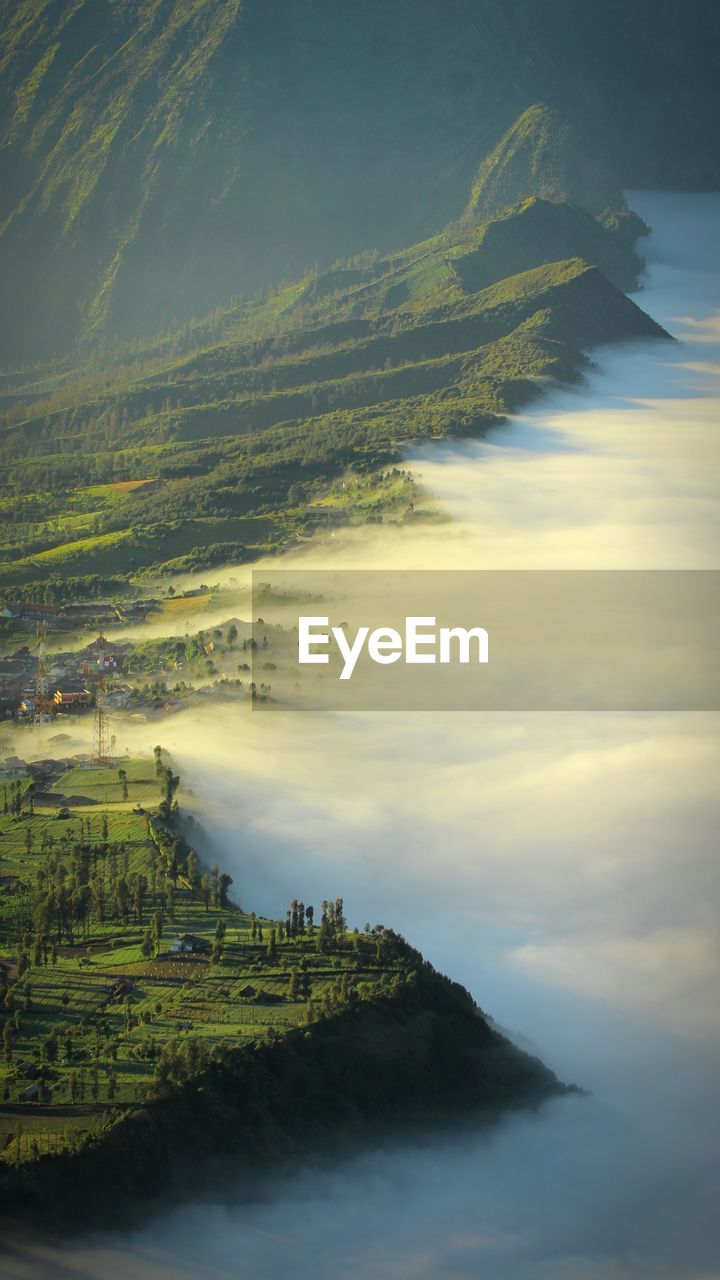 Scenic view of mountain and cloudscape