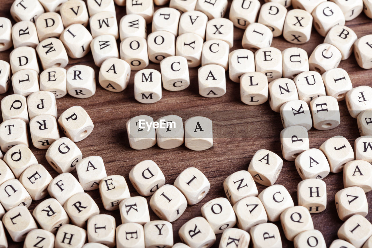 Word 2fa in letters on cube dices on table.