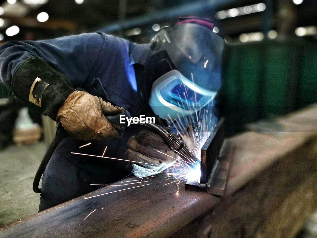 Welder working at construction site