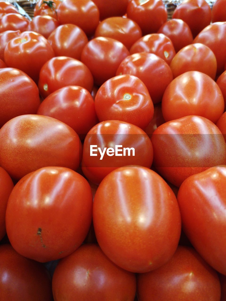 FULL FRAME SHOT OF TOMATOES FOR SALE