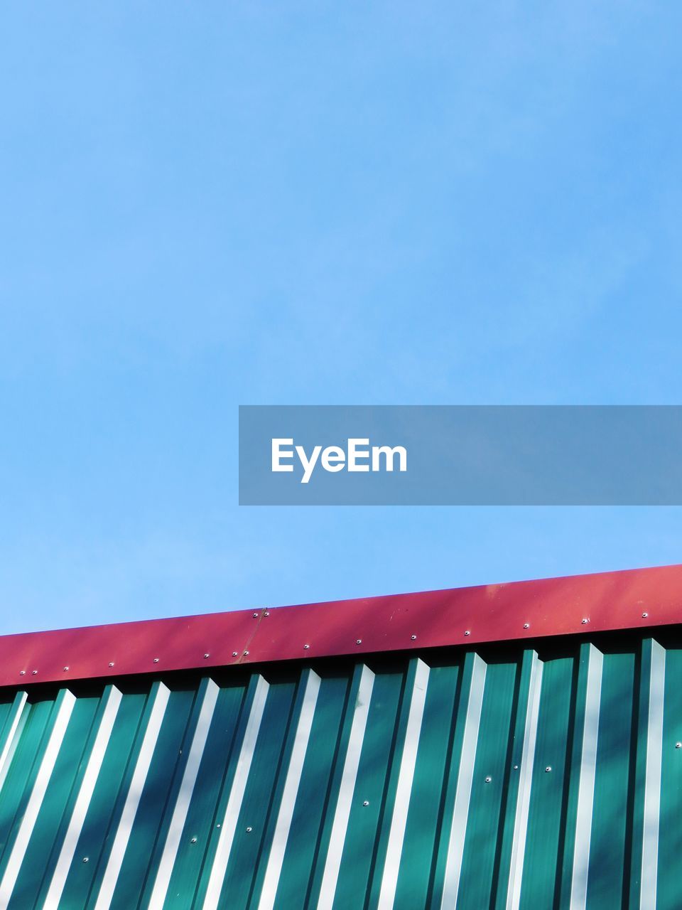 LOW ANGLE VIEW OF ROOF AGAINST CLEAR SKY