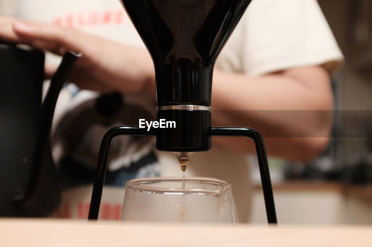 Close-up of coffee cup in cafe