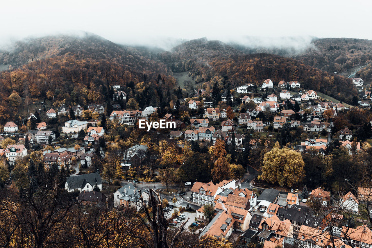 High angle view of townscape and trees in city