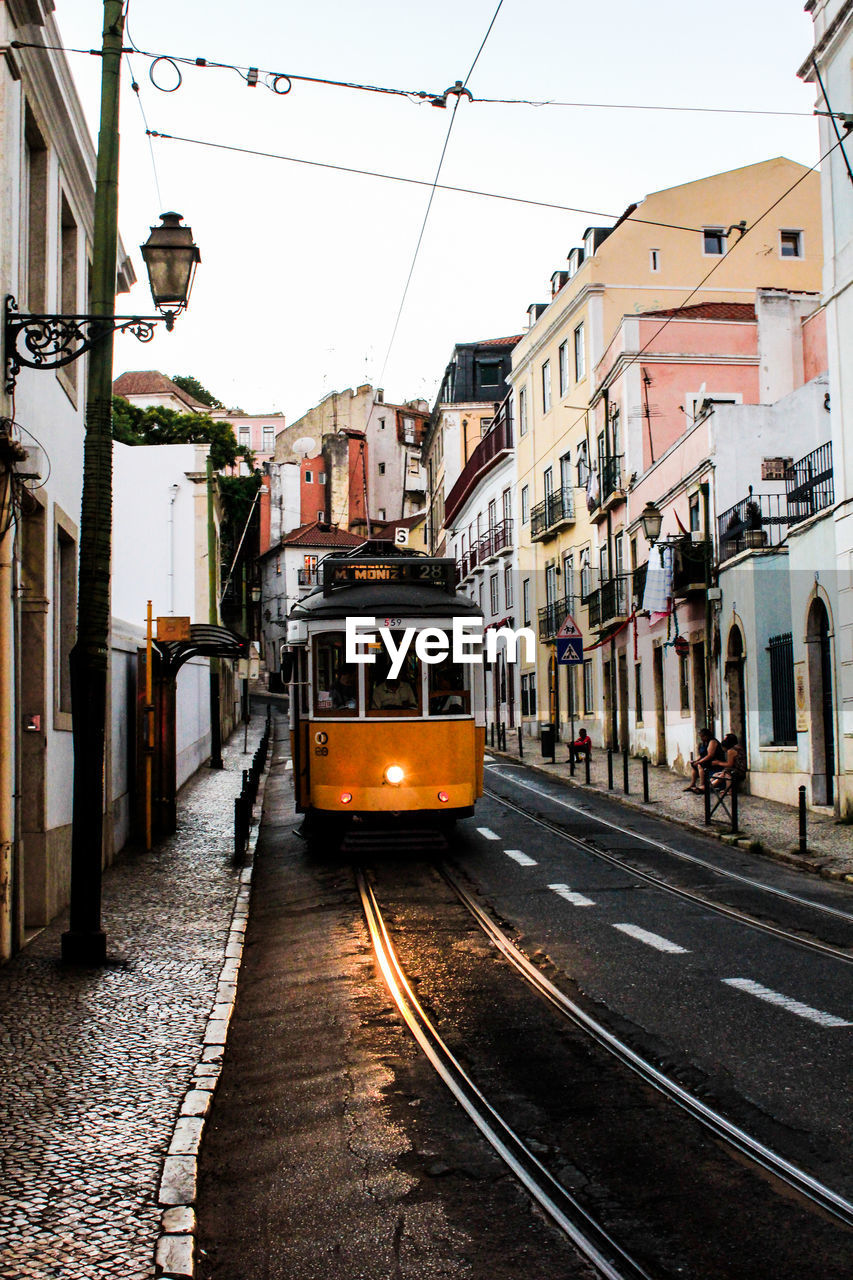 View of cable car on lisbon city street