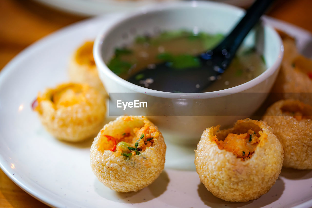 Close-up of served food in plate