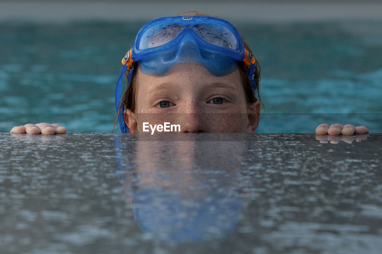 Portrait of child in swimming pool