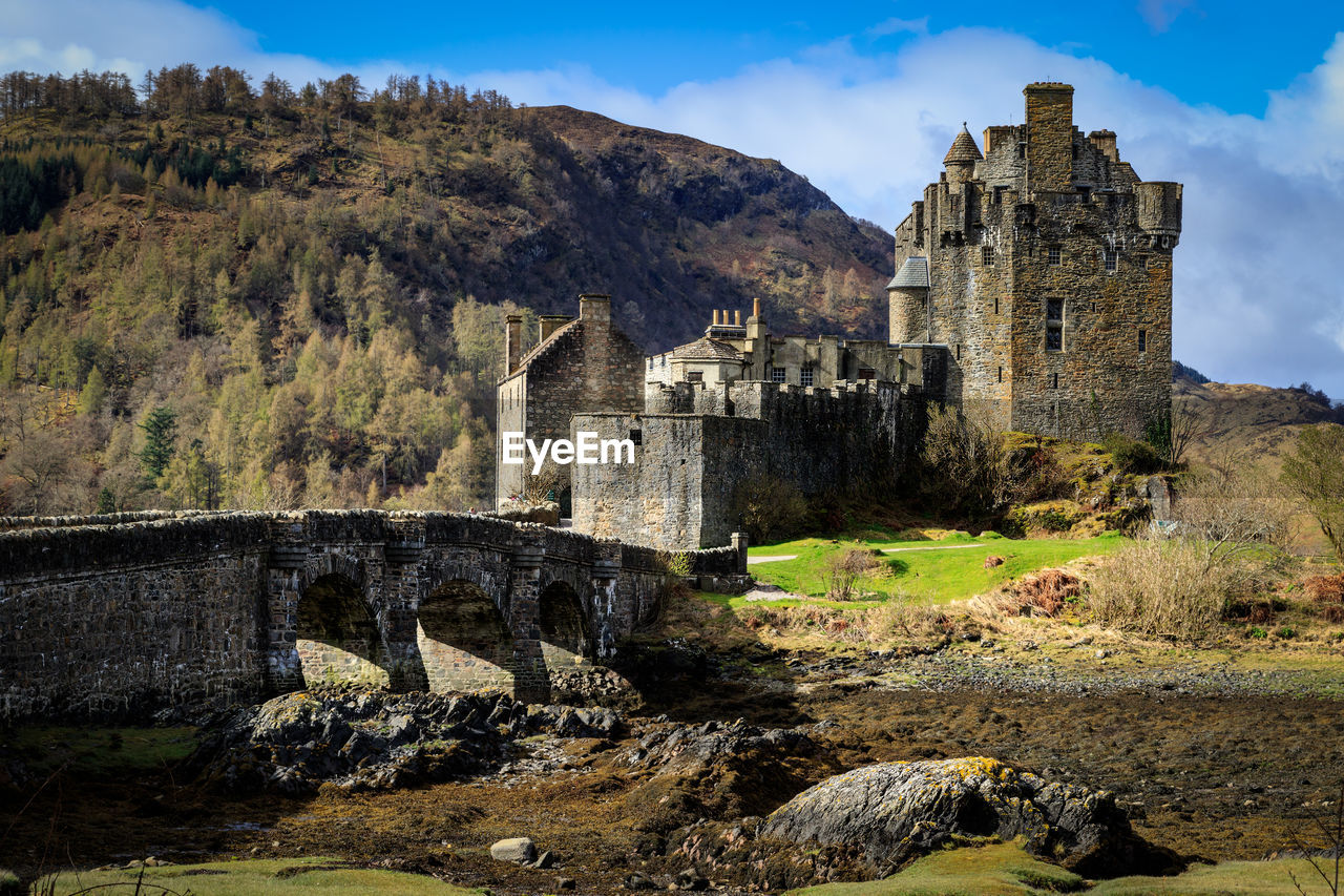 low angle view of old ruins against sky