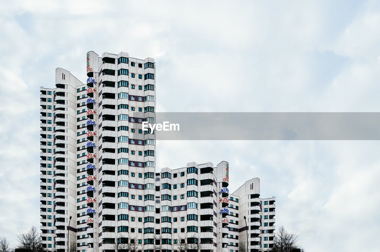 Low angle view of residential building against sky