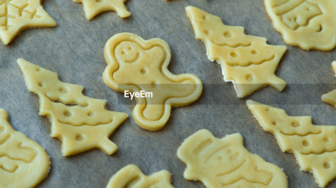 Raw christmas home made butter biscuits cookies. gingerbread man cookie. 