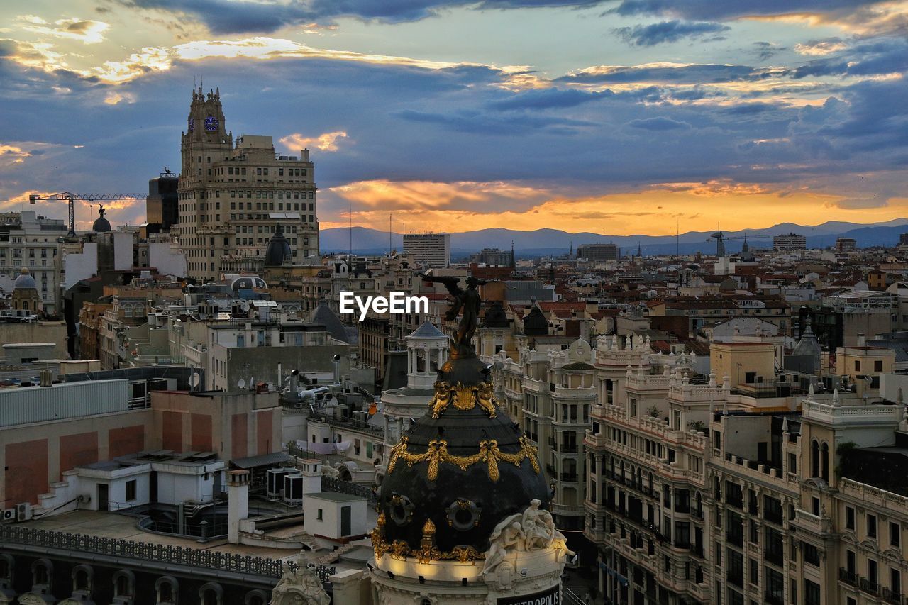 VIEW OF CITY AT SUNSET