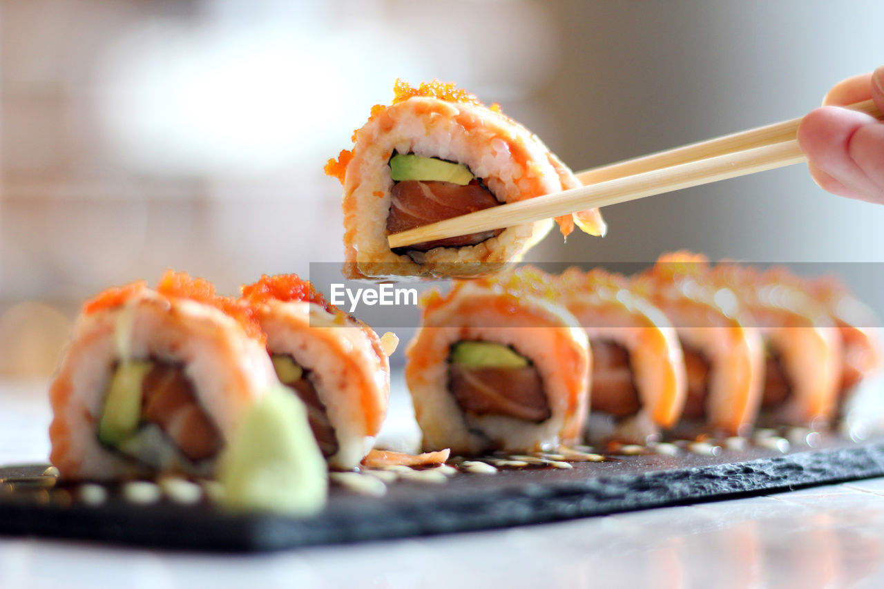 CLOSE-UP OF SUSHI IN TRAY