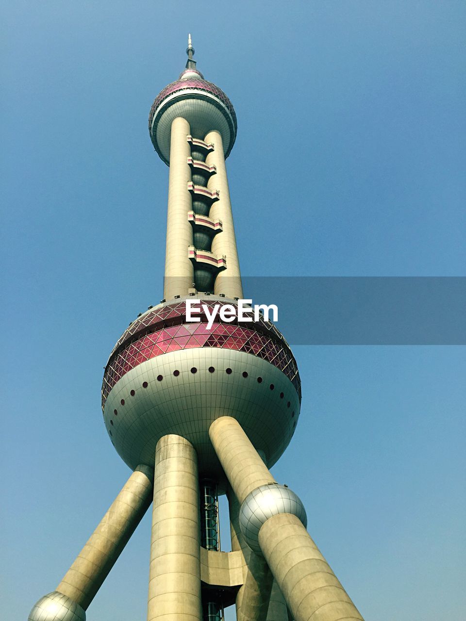 Low angle view of oriental pearl tower against clear sky